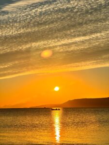 sunset over the water in Crete