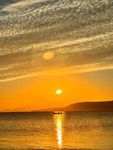 sunset over the water in Crete